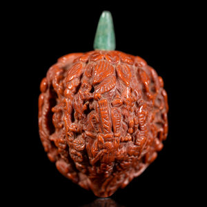 A Chinese Carved Peach Pit Snuff