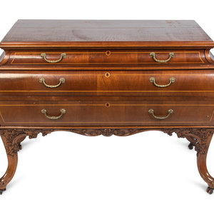 A Louis XV Style Walnut Bombe Commode
20th