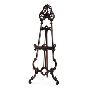 A Renaissance Revival Carved Walnut