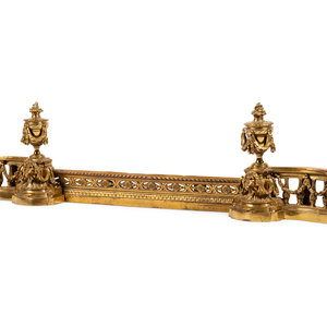 A Louis XVI Style Brass Fire Fender