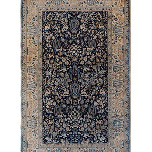 A Tabriz Wool Rug
6 feet 4 inches x