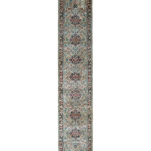 A Qum Silk Runner
20TH CENTURY
14