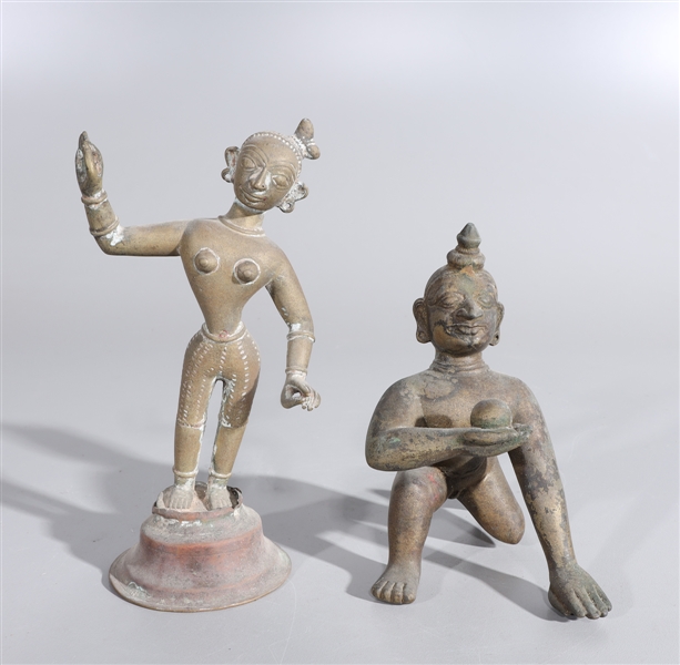Pair of antique Indian statues featuring