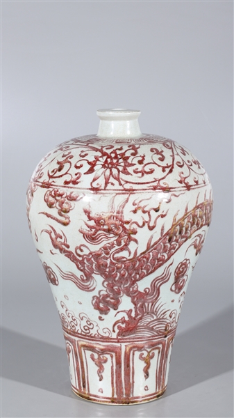 Chinese red and white vase featuring