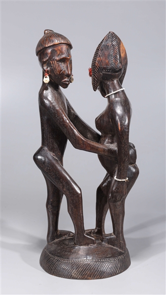 Carved wood African statue of two figures,