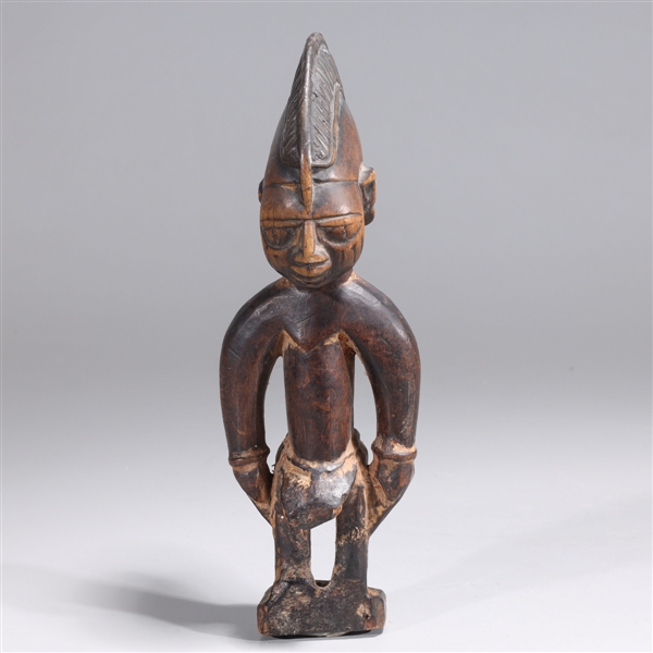 Single West African carved wood