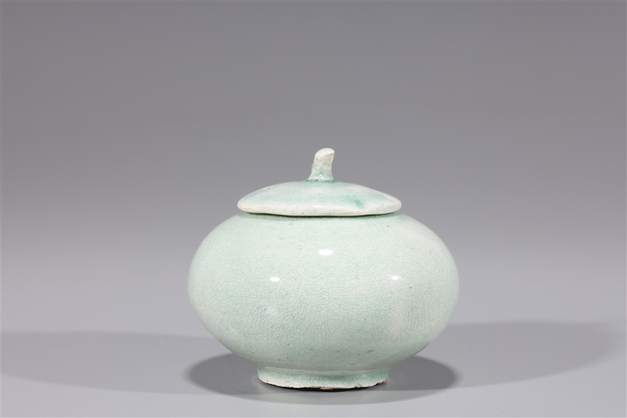 Korean Celadon glazed covered jar;