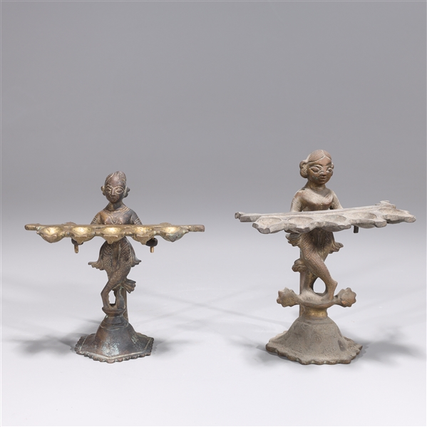 Pair of antique Indian bronze oil lamps,