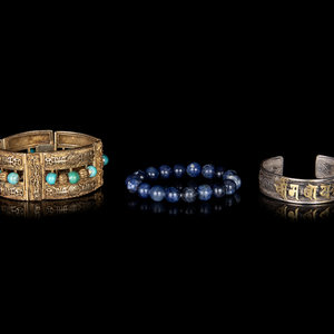 Three Chinese Bracelets
comprising