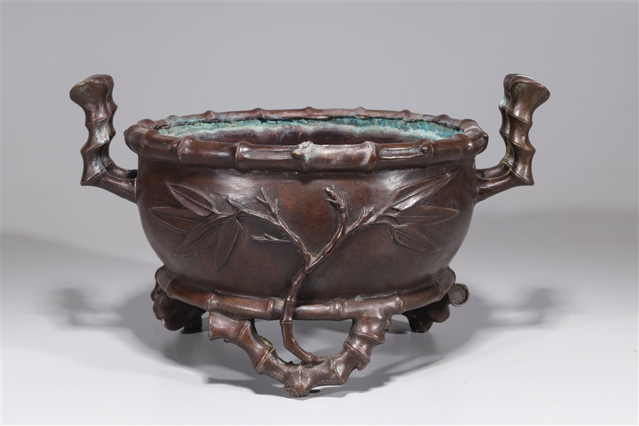 Chinese bronze censer with bamboo