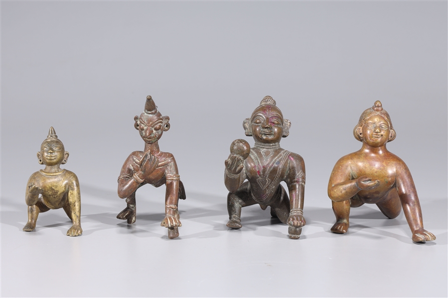 Group of four antique Indian Bala Krishna