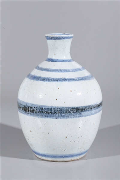 Chinese white ceramic vase with repeating