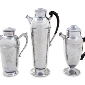 A Group of Three Cocktail Shakers 20th 2ad5d9