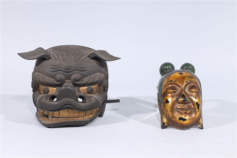 Two Japanese masks including figural