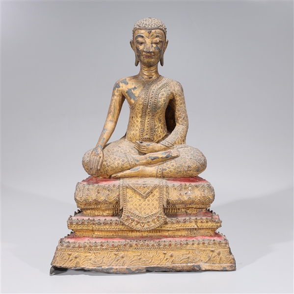 Antique Thai metal seated deity,