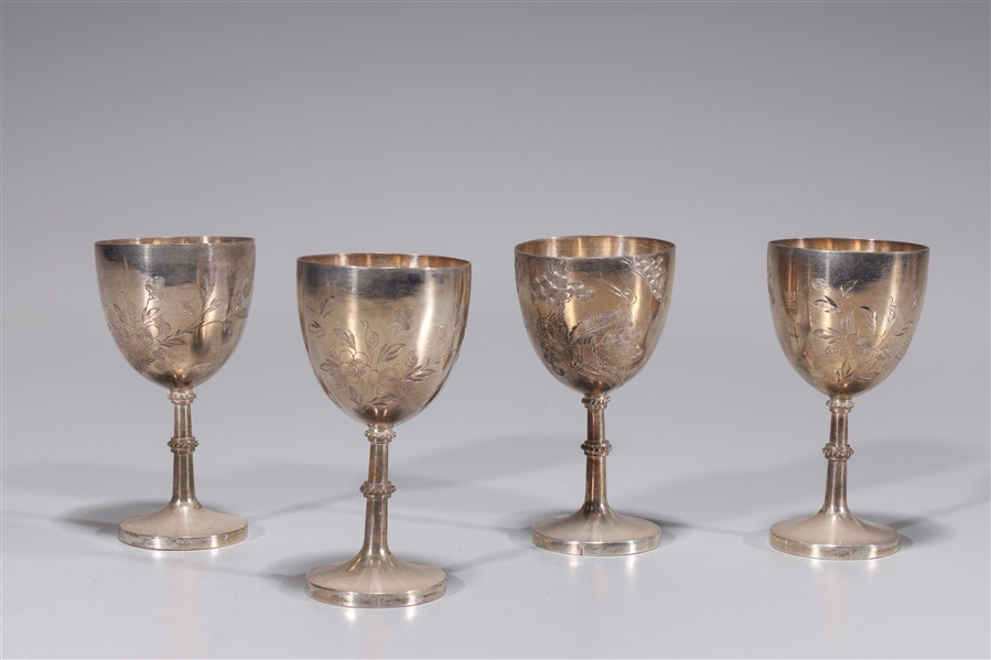 Set of four silver Chinese wine