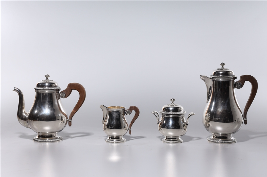 Four piece silver plate Christolfe set;