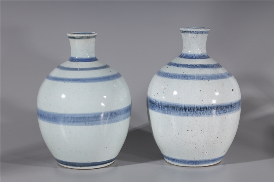 Two Chinese porcelain vases; each