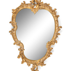 A Rococo Style Giltwood Mirror
Late
