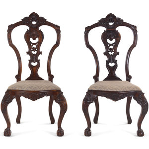 A Pair of Continental Carved Walnut