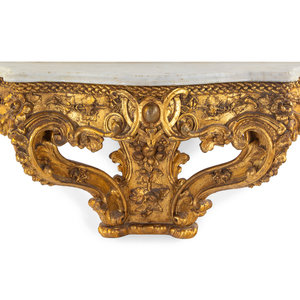 An Italian Rococo Carved Giltwood