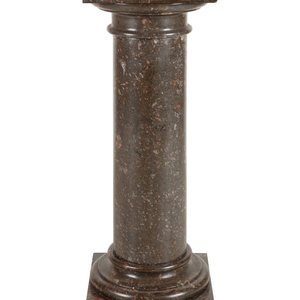 A Neoclassical Carved Marble Pedestal
Late