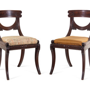 A Pair of Late Regency Carved and