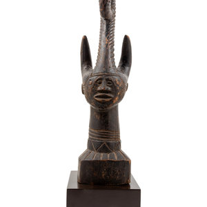 An Igbo Style Carved Wood Sculpture
Mid-20th