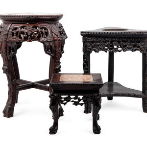 Three Chinese Carved Hardwood Stands
Late