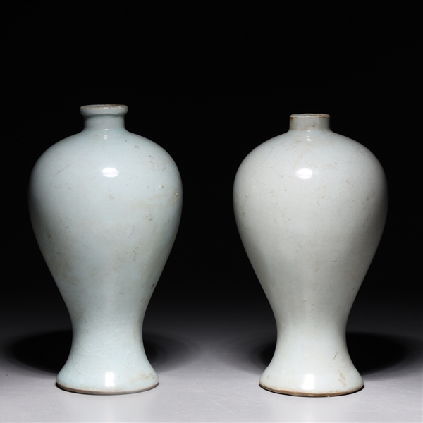 Pair of Chinese pale celadon glazed