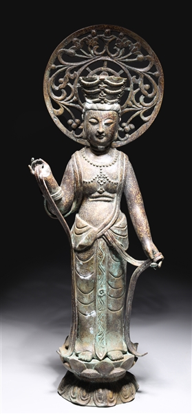 Chinese bronze metal deity atop
