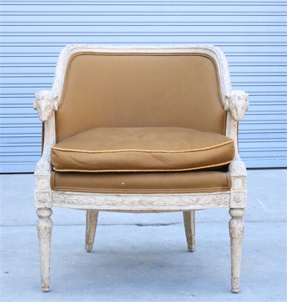 Carved wood and upholstered arm chair,