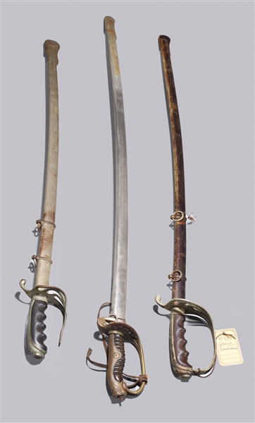 Group of three vintage swords including