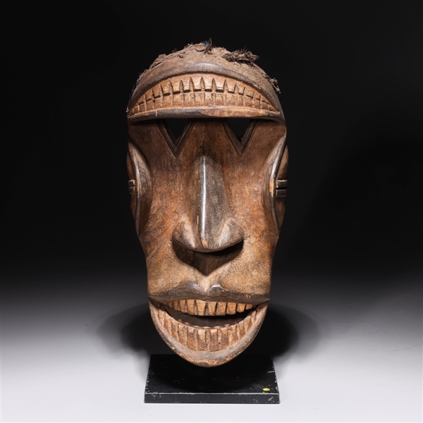 Carved wooden African mask with 2ac157