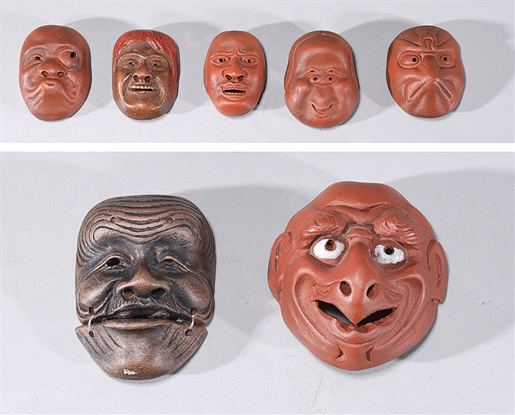 Group of 7 ceramic mask form netsukes 2ac3ed