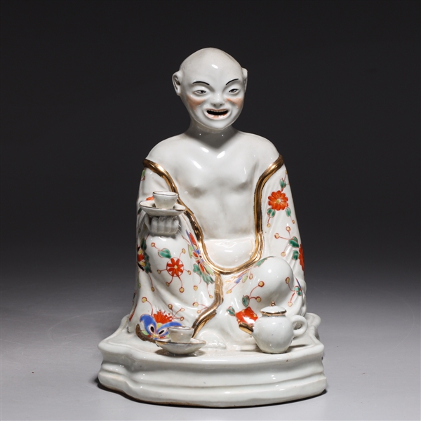 Chinese porcelain figure with gilt detail