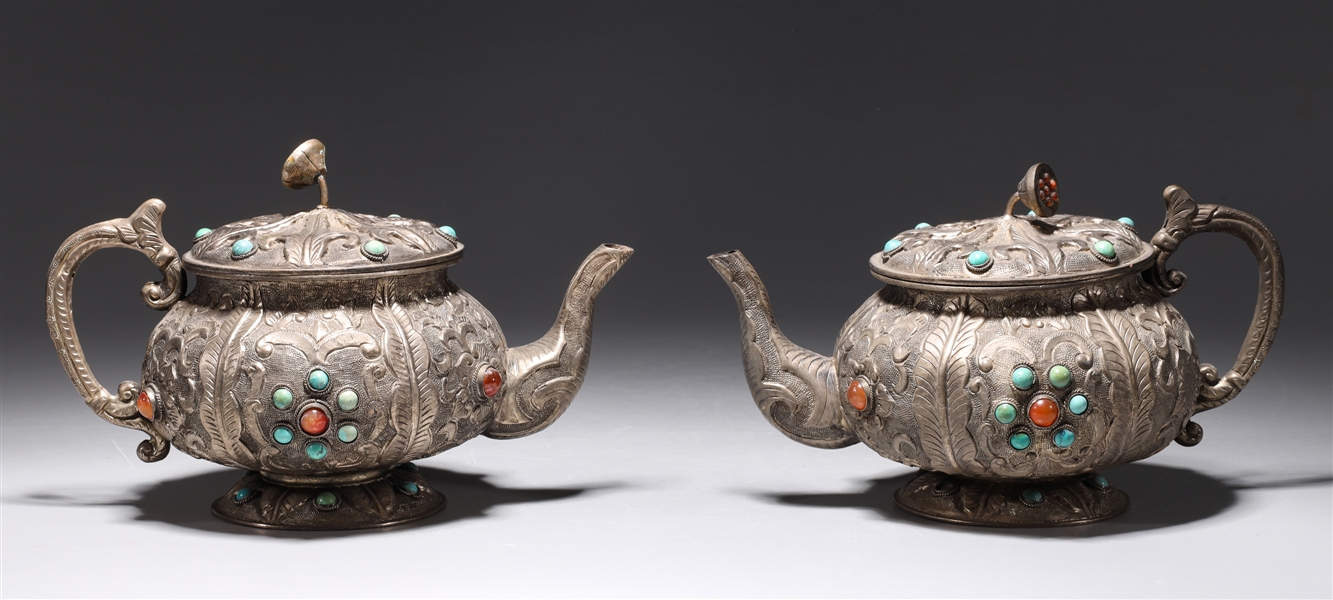 Pair of Chinese repose metal teapots 2ac474