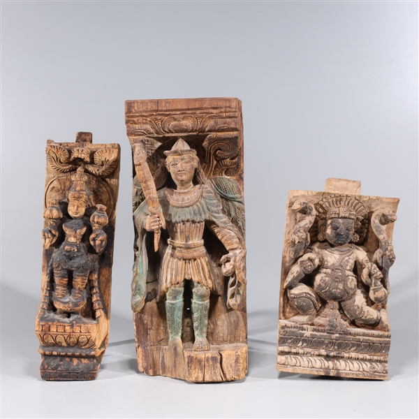 Group of three Indian carved wood