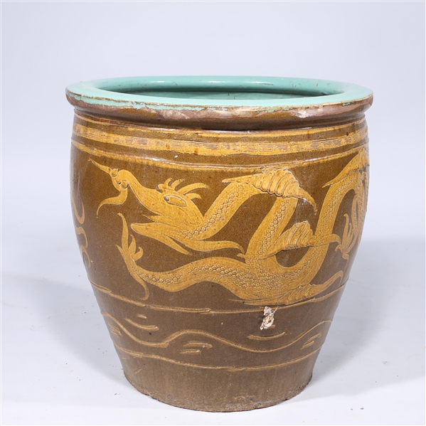 Chinese ceramic dragon jar; some wear,