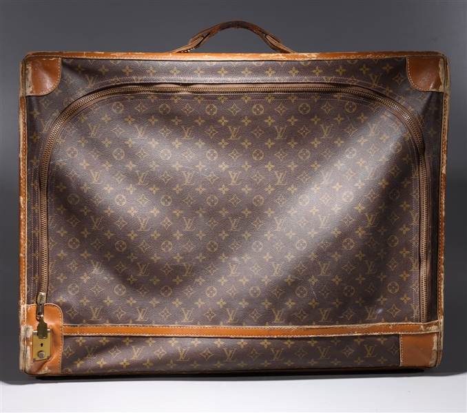 Louis Vuitton suitcase with straps  2ac5a4