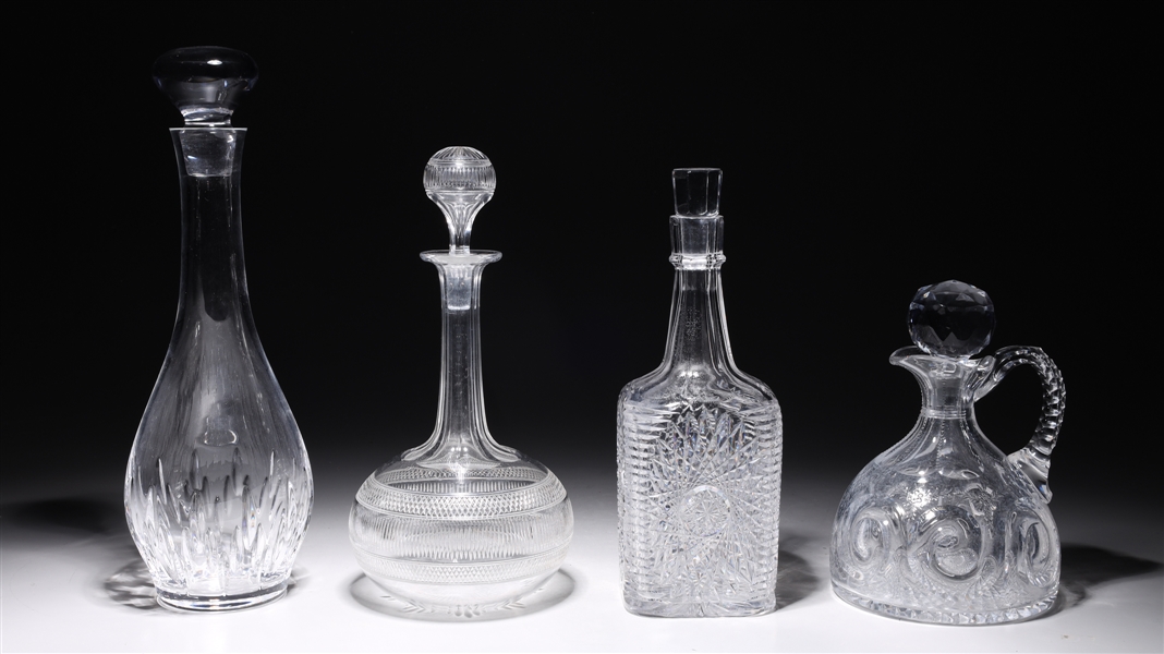 Lot of four cut glass decanters,