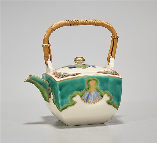Japanese ceramic tea pot; bamboo handle;