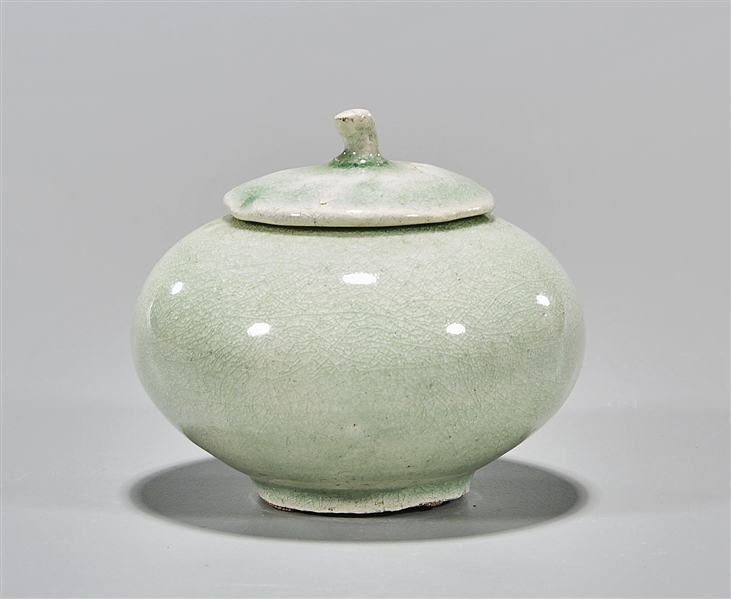 Korean Celadon glazed covered jar; D: