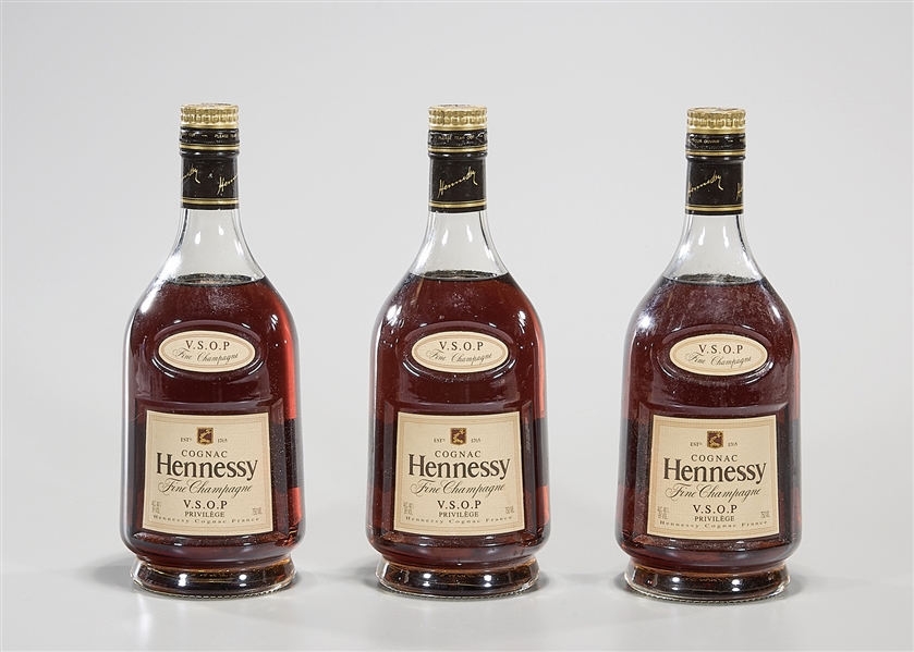 Three bottles of Hennessy VSOP