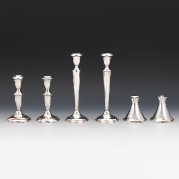 THREE PAIR STERLING SILVER CANDLESTICKS