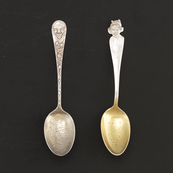 TWO BLACK AMERICANA STERLING SPOONS