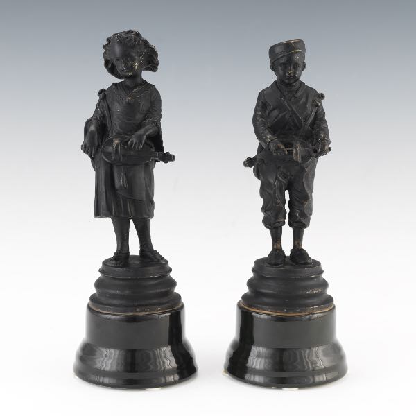 TWO PATINATED SPELTER CABINET SCULPTURES
