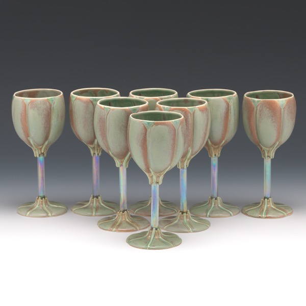 EIGHT NEWMAN CERAMIC WORKS GOBLETS