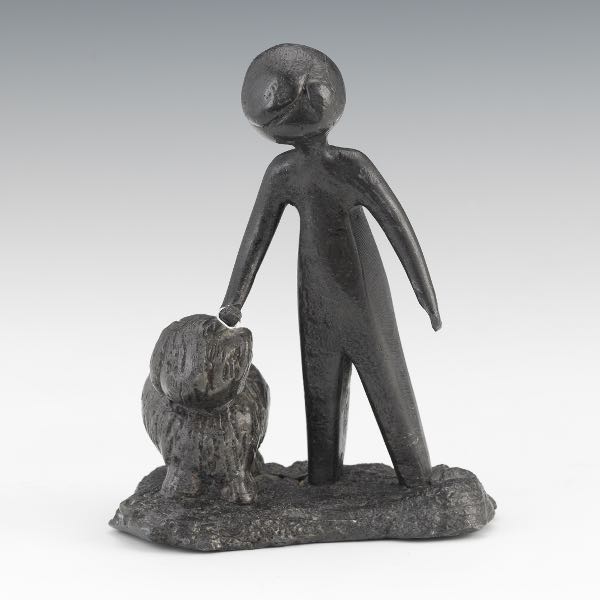 WHITE METAL FIGURINE OF MAN WITH