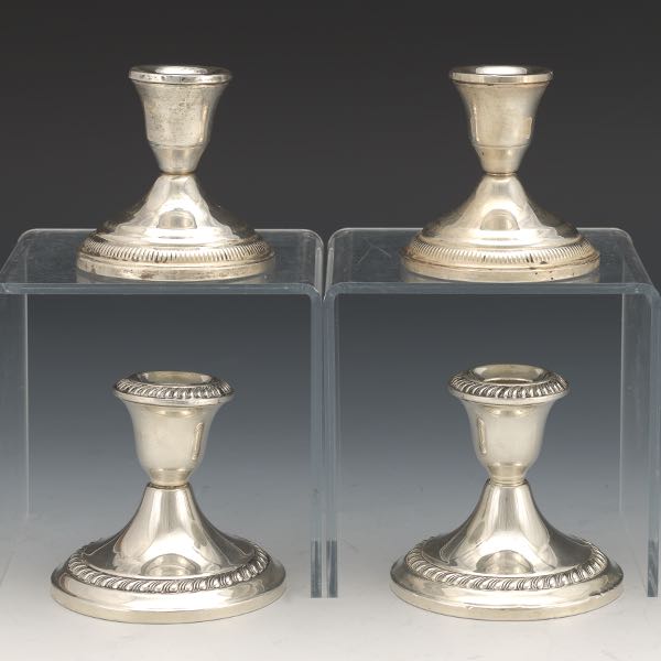 FOUR STERLING SILVER WEIGHTED CANDLEHOLDERS 2afd30